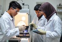 Ilustrasi tim mahasiswa ITS sedang melakukan uji coba mobil hemat energi di laboratorium dengan peralatan pengukuran yang canggih.