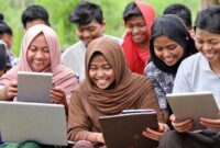 A group of diverse Indonesian people, from different age groups and backgrounds, happily using laptops, smartphones, and tablets, some in a rural setting, engaged in learning or commerce, illustrating digital literacy and empowerment.